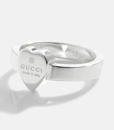 Pledge your love for Gucci with this sterling silver ring. Its heart detail is engraved with branding and a note about its Italian roots. We envision the understated design worn stacked alongside the house's more decadent accessories..Material: 925 sterling silver.Made in Italy.Designer color name: Argento.Max. width 10mm-0.4' Classic Gucci Engraved White Gold Ring, Gucci Fine Jewelry White Gold Rings, Gucci White Gold Fine Jewelry Ring, Gucci White Gold Ring In Fine Jewelry Style, Gucci Silver Ring With Polished Finish, Gucci Fine Jewelry Ring For Anniversary, Gucci Rings With Polished Finish For Gift, Classic Gucci Engraved Ring For Anniversary, Classic Gucci Engraved Ring As Gift