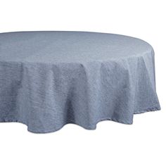 a round table with a light blue linen cover on it's top and bottom