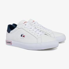 The Powercourt pays tribute to Lacoste's sporting heritage with its clean-lined silhouette and fuss-free detailing. Perfectly demonstrating its athletic prowess, the trainer features a low-top style with leather and synthetic uppers for increased form and functionality. The tricolor embroidered crocodile on the quarter and webbing on the leather coated heel offer a dynamic design twist on the classic signature branding. Upper: Leather (92.9%), Polyurethane (7.1%) / Lining: Polyester (100%) / Ins Classic Custom Sneakers With Embossed Logo For Sports, Classic Low-top Skate Shoes With Embossed Logo, White Leather Skate Shoes With Embossed Logo, Classic Skate Shoes With Embossed Logo For Sports, Classic White Low-top Golf Shoes, Classic Skate Shoes For Sports, Sporty White Skate Shoes With Contrasting Heel, Classic Leather Skate Shoes With Vulcanized Sole, Classic Leather Skate Shoes