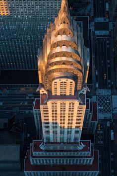 an aerial view of the top of a building in new york city at night time