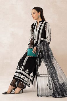 Black Pakistani Salwar Kameez Embroidered Suit is a perfectly stitched masterpiece that will win everyone's hearts at the very first glance with its charm and elegance. The lavish contrast of black shade and premium quality of the fabric makes it an epitome of beauty and grace. Black Dabka Kurta For Party, Black Bollywood Lawn Suit For Festive Occasions, Elegant Embroidered Black Lawn Suit, Elegant Black Embroidered Lawn Suit, Black Long Sleeve Georgette Dress, Black Salwar Kameez With Intricate Embroidery For Wedding, Black Georgette Lawn Suit For Eid, Festive Black Lawn Suit With Dabka Work, Elegant Black Lawn Suit With Dabka Work