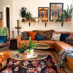 a living room filled with lots of furniture and plants on top of it's shelves