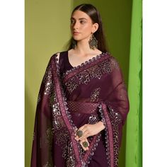 Wine colored saree is made from georgette fabric which is highlighted with beautiful sequins embroidered work as shown. comes along unstitched mono banglori blouse which you can customise as per your design/style. Occasion - You can wear this saree for party and functions. Note:- The actual product may differ slightly in color and design from the one illustrated in the images when compared with computer or mobile screen. Measurements: Saree : Georgette : 5.5 Mtrs Blouse : Georgette : 0.8 Mtr Mat Purple Georgette Pre-draped Saree For Festivals, Purple Georgette Pre-draped Saree For Eid, Embroidered Purple Georgette Pre-draped Saree, Navratri Georgette Pre-draped Saree With Mirror Work, Purple Pre-draped Saree With Mirror Work For Navratri, Navratri Purple Pre-draped Saree With Mirror Work, Purple Embroidered Georgette Fabric Saree, Purple Anarkali Pre-draped Saree With Mirror Work, Pre-draped Purple Saree With Mirror Work