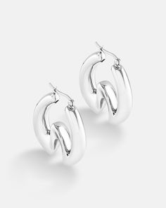 This hoop earring is unique and has a quiet luxury vibe to it. It has a W freeform shape type of pattern and the design is organic. The style is versatile where it is suitable to be worn on all occasions. The earrings are made in sterling silver and is plated in 18K yellow gold or white gold. Each earring is hand polished and quality inspected to assure a luxurious finish. Bamboo Hoop Earrings, Chunky Hoop Earrings, Quiet Luxury, Earring Sale, Ear Jewelry, Silver Hoop Earrings, Shop Earrings, Post Earrings, Statement Earrings