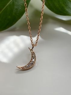 "Dainty Diamond Moon Necklace Pendant in 14k rose gold. This necklace is perfect by itself or or layered. You can wear it day or night. This necklace is versatile and perfect as a gift. Effortlessly trendy and beautiful! Metal14k Rose gold Pure gold / Finish.... polish NecklaceHandmade in USA Diamond weight0.10CT G - VS1 quality *14k rose gold chain included * Chain sizes Available.. 16\", 18\" , 20 inches long" 14k Rose Gold Necklaces For Gifts, 14k Rose Gold Necklace For Gift, Gift Rose Gold Necklace In 14k Rose Gold, Elegant Rose Gold Charm Necklace As Gift For Her, Gift Rose Gold Necklace In 14k, Elegant Crescent Charm Necklace With Delicate Chain, Minimalist 14k Rose Gold Necklace As Gift, Minimalist 14k Rose Gold Necklace, Elegant Rose Gold Charm Necklace For Her