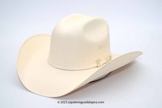 TOMBSTONE 1000X TELAR ESTE-OESTE | Genuine Leather Vaquero Boots and Cowboy Hats | Zapateria Guadalajara | Authentic Mexican Western Wear White Western Hat For Formal Occasions, White Western Formal Hat, Classic White Top Hat With Flat Crown, Western Style White Top Hat With Flat Crown, White Flat Crown Hat For Rodeo, White Flat Crown Country Hat, White Country Hat With Flat Crown, White High Crown Hat Bands For Rodeo, Elegant High Crown Top Hat For Rodeo