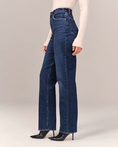 On-trend 90's-style ultra high rise straight jeans in our signature Curve Love fit with built-in stretch for superior comfort featuring our highest rise that sits at your natural waist and looks great with your shirt tucked or untucked. Curve Love features an additional 2" through the hip and thigh to help eliminate waist-gap. With refined details and a vintage feel from top to bottom, this style features a full-length leg, dark wash and clean hem. Mom Fit Bottoms With Straight Hem For Everyday, Everyday Mom Fit Bottoms With Straight Hem, Casual Flare Jeans With Straight Silhouette, High Rise Mom Fit Denim Blue Bottoms, Chic Mid-rise Mom Fit Bottoms, Chic High Rise Flare Jeans With Straight Fit, Chic High Rise Straight Fit Flare Jeans, Everyday Jeans With Relaxed Fit, Straight Silhouette, Straight Silhouette Denim Jeans For Spring