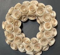 a close up of a wreath made out of shells