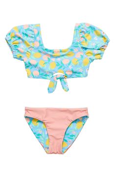 Your little one can squeeze the most fun out of the next beach day in this two-piece with a lemon-print, puff-sleeve top paired with reversible bottoms. UPF 50+ sun protection Bottoms are reversible Lined 80% polyamide, 20% elastane Machine wash, tumble dry Imported Lemon Drops, Reversible Bikinis, Lemon Print, Skirt Jumpsuit, Lemon Drop, Resort Collection, Swim Accessories, Puff Sleeve Top