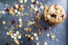 a cookie with cranberries and white chocolate chips