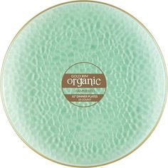 a green plate with gold trim and an organic label on the front, against a white background