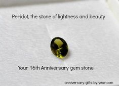 a close up of a gems stone on a white surface with words describing the benefits of periott, the stone of lightness and beauty