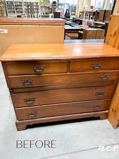 an old dresser is being refinished with new paint