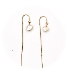 These gorgeous Keshi pearl thread earrings are timeless and classy. They shimmer in the light and match any outfit, about the size of a pea.Available with 14k gold fill ear threads or sterling silver*14K Gold filled metal is highly superior to "gold plated" as it is non-tarnish, can be worn in water, and is hypoallergenic.Want it with regular earwire? Just ask! Minimalist Pearl Drop Threader Earrings, Minimalist Long Drop Pearl Earrings With Ear Wire, Elegant 14k Gold-filled Rose Gold Threader Earrings, Elegant 14k Gold Filled Single Threader Earring, Elegant Rose Gold 14k Gold-filled Threader Earrings, Minimalist Gold Pearl Threader Earrings, Gold Linear Earrings With Pearl Drop, Elegant 14k Gold Filled Pearl Drop Threader Earrings, Minimalist Pearl Threader Earrings As Gift