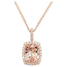 1.74ct Morganite & Diamond Pendant Necklace in Rose Gold Introducing our exquisite Morganite Pendant in 14k Rose Gold. This dazzling pendant features a mesmerizing 1.74 carat Morganite graced by 0.18 carats of glittering Diamonds with exceptional clarity and color. This divine pendant is elegantly suspended from a delicate rose gold chain. The Morganite's soft, peachy-pink hue adds a captivating touch. With a weight of 3g and an 18" chain, this piece is both substantial and comfortable. This lov Morganite Pendant, Morganite Diamond, Diamond Glitter, Rose Gold Chain, Fine Jewelry Collection, Peachy Pink, Diamond Pendant Necklace, Morganite, Diamond Pendant