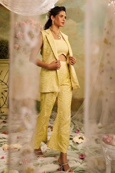 Lemon yellow tonal sequin and cutdana embroidered waistcoat. Paired with an embroidered bustier and pant. - Aza Fashions Fitted Pant Set With Intricate Embroidery For Party, Glamorous Fitted Palazzo Set With Zari Work, Festive Chic Designer Palazzo Set, Festive Chic Fitted Sets, Fitted Embroidered Pant Set For Party, Fitted Bollywood Party Suits, Embroidered Fitted Pant Set For Party, Glamorous Fitted Sets For Eid, Fitted Pant Set With Zari Work For Designer Wear