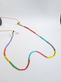 summer beach glasses chain beaded glasses strap eyeglass chain sunglasses strap sunglass holder beaded glass strap sunglasse cord glass cord Handmade eyeglass holder.  The strap is 31 inches long, if you pretend another size please let me know :) Handmade with love :) Beaded Glasses Chains With Round Beads, Adjustable Glass Beaded Necklaces For Summer, Summer Glass Beads Glasses Chains, Summer Glass Beaded Necklaces, Multicolor Adjustable Jewelry For Summer, Black Glasses Chains For Summer Beach, Colorful Beads Glasses Chains As Summer Gift, Summer Glasses Chains With Colorful Beads As Gift, Colorful Beaded Glasses Chain For Summer Beach