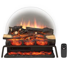 an electric fireplace with logs and flames in the center, next to a remote control