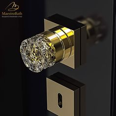 a close up of a door handle with a diamond on it