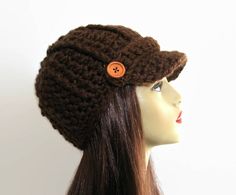 This is made to order. This hat is crocheted with chunky weight acrylic brown yarn. Buttons may vary depending on availability. If you would like a different color just let me know. Some of the other colors I have are black, black tweed, brown, brown tweed, oatmeal tweed, taupe, gray tweed, light gray, dark purple and white. However, if you want a different color I can get whatever you like. Hand wash is recommended. Check out all my newsboy hats here: https://www.etsy.com/shop/CreativeDesignsby Adjustable Brown Crochet Cap, Brown Yarn Brimmed Hat, Adjustable Brown Brimmed Crochet Hat, Adjustable Crochet Brown Hat, Brown Brimmed Crochet Hat One Size, Brimmed Brown Crochet Hat For Fall, Brown Hand Knitted Cap, Hand Knitted Brown Cap, Brown Crochet Cap Hat