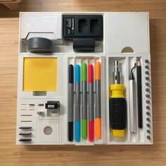 an assortment of office supplies including pens, markers and pencils