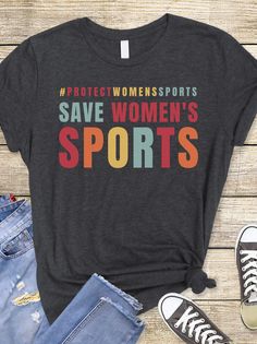 "Show your support for female athletes with our \"Save Women's Sports\" t-shirt, featuring a bold statement design and made from soft, high-quality cotton. Wear this shirt proudly to raise awareness and advocate for policies that protect women's sports, real feminism and upholding fairness in competition. Premium Quality - Printed shipped in the USA DETAILS Every T-shirt / Sweatshirt we send out is made to order, which means it is custom made for you! We do everything we can to ship orders as fast as possible, but you can check our current turnaround times below. If you have any questions, do not hesitate to ask - we do our best to respond within 1 business day! BELLA + CANVAS T-SHIRT This classic unisex jersey short sleeve tee fits like a well-loved favorite. Soft cotton and quality print Graphic Sports T-shirt With Text Print, Sporty Text Print T-shirt For Gym, Sporty T-shirt With Text Print For Sports Events, Sporty Letter Print T-shirt For Sports, Sporty Workout T-shirt With Slogan, Sporty Team Name T-shirt For Workout, Athletic Heather T-shirt With Letter Print For Sports, Sporty T-shirt With Team Name For Gym, Sporty Athletic Heather T-shirt With Text Print