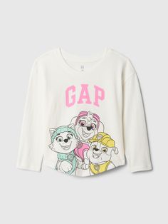 Soft cotton-blend graphic T-shirt.  Crewneck.  Long sleeves.  Gap arch logo and Paw Patrol graphics at front.  This T-shirt is made with 40% recycled polyester.  Compared to virgin materials, using recycled materials helps to reduce resource use and waste.  Straight, easy fit.  Hits at the hip.  Sizes range from baby to toddler. Gap Cotton T-shirt With Letter Print, Gap Graphic Tee With Character Print, Gap Graphic Tee With Screen Print, Gap Graphic Tee With Letter Print, Gap Cotton Tops With Character Print, Gap Crew Neck Tops With Screen Print, Gap White Graphic Print T-shirt, White Gap T-shirt With Graphic Print, Gap Cotton Tops With Logo Print