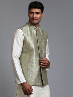 Vastramay Men's Mehndi Green Embellished Jacket Discover the elegance of the Vastramay Men's Mehndi Green Embellished Jacket, crafted for both style and comfort. This jacket combines traditional craftsmanship with contemporary design, making it a versatile addition to any wardrobe. Features Embellished design Comfortable fit High-quality fabric Stylish and versatile Specifications Color: Mehndi Green Sizes Available: S, M, L, XL Occasion: Casual, Festive Closure: Buttoned Material & Care Materia Traditional Embellished Bandhgala For Festive Season, Embellished Long Sleeve Bandhgala For Festivals, Elegant Nehru Jacket With Mirror Work For Festivals, Festive Embellished Nehru Jacket For Eid, Traditional Embellished Nehru Jacket For Festive Season, Traditional Embellished Bandhgala For Eid, Traditional Embellished Festive Nehru Jacket, Embellished Bandhgala For Festive Occasions, Festive Embellished Bandhgala For Festivals