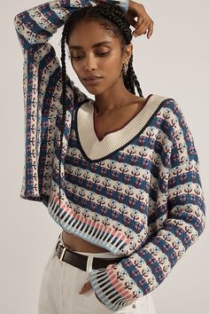 Add a touch of coziness to your close-knit circle with the Maeve V-Neck Cropped Sweater - a wide V-neckline, striped ribbed edges, and graphic floral pattern complete the look. | V-Neck Cropped Sweater by Maeve in Blue, Women's, Size: XL, Cotton/Nylon/Acrylic at Anthropologie Anthropologie Fall, Cute Sweaters For Fall, Winter Knit Sweater, Graphic Floral, Fall Sweater, Early Fall Outfit, Long Sleeve Knit Sweaters, Sweater Tank Top, Knitting Women Sweater