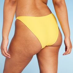 Extra-cheeky bikini bottom from Wild Fable™ in a solid hue. Made from soft fabric with spandex and full lining for stretchy comfort in and out of the water. Opaque construction with low rise and ultra-high leg. If you're not satisfied with any Target Owned Brand item, return it within one year with a receipt for an exchange or a refund. Wild Fable™: A look for every story. Solid Seamless Bottoms For Poolside, Solid Stretch Tankini Brief, Solid Color Stretch Tankini With Briefs, Solid Color Stretch Tankini Brief, Beach Bottoms With Smoothing Solid Color, Solid Smoothing Swimwear For Sunbathing, Solid Nylon Bottoms For Beach Season, Nylon Solid Color Beach Bottoms, Solid Smoothing Brief Swimwear