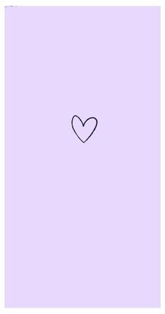 a heart drawn on the side of a purple wall