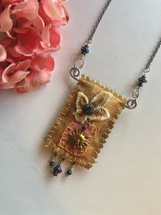 This is a pretending amulet bag necklace. Excelente gift for a bohemian, casual sun lover. It is unique and handmade. I added a beautiful sun charm, beads and a lace painted in golden colors. The center peace is aproximately 1 .75 x 2.25 inches big. The color could be slightly different because your monitor settings. ¡Check for more necklace in my shop! Sun Amulet, Women Freedom, Angel Wings Painting, Lace Painting, Purple Headbands, Valentines Presents, Amulet Necklace, Doll Jewelry, Diy Wire Jewelry