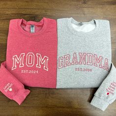 Custom Embroidered Sweatshirt Mom Grandma Name On Sleeve With Heart All hoodies and crewneck sweatshirts are fleece. 65% cotton 35% poly Care instructions: Machine cold wash, inside out, with like colors. Only non-chlorine bleach. Tumble dry low. Medium iron. Do not iron decoration. Double-needle stitched neckline, bottom hem and sleeves t-shirt. Unisex sizing. Size chart is available in the listing photos. All measurements are approximate. Measurements may vary about 2″ less or more. Custom Embroidered Sweatshirt, Grandma Names, Name Embroidery, Grandma Shirts, Mom And Grandma, Embroidered Sweatshirt, Embroidered Sweatshirts, Gifts For New Moms, Grandma Gifts