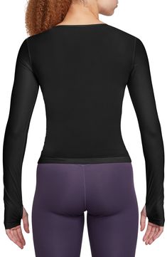 Dri-FIT tech keeps you dry while you push your limits in this ultrasmooth and sheer top framed with long sleeves with thumbholes for extra coverage. 21 1/2" length (size Large) Bateau neck Long sleeves with thumbhole cuffs Dri-FIT moisture-wicking technology 72% polyester, 28% spandex Machine wash, tumble dry Imported Solid Micro-elastic Go-dry Tops, Solid Color Go-dry Micro-elastic Tops, Micro-elastic Gym Tops With Go-dry, Micro-elastic Go-dry Top For Workout, Moisture-wicking Micro-elastic Tops For Pilates, Micro-elastic Moisture-wicking Tops For Pilates, Sporty Moisture-wicking Micro-elastic Tops, Sporty Micro-elastic Moisture-wicking Top, Moisture-wicking Micro-elastic Athleisure Top