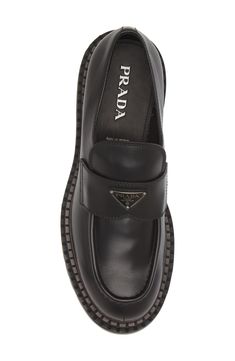 Prada's iconic triangular logo shines on a brushed-leather loafer tastefully updated with a tiered platform sole ridged to look like a chocolate bar. Slip-on style Leather upper and lining/rubber sole Made in Italy Designer Shoes Luxury Platform Loafers With Rubber Sole, Luxury Formal Platform Loafers With Lug Sole, Designer Calf Leather Platform Loafers For Business, Designer Formal Platform Loafers, Luxury Business Loafers With Studded Rubber Outsoles, Luxury Studded Loafers For Business, Platform Loafers, Double Chocolate, Fabric Gift Bags