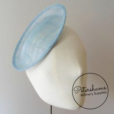 This oval scallop shape light blue sinamay fascinator base is made from a triple layer of stiffened sinamay millinery fabric and is ideal for making an instant hat! Get creative by positioning it at different angles on the head. Just add elastic, headband or comb for securing to the head (not included but available in our shop!)Measurements:Length: 19.5cm (7.6 inch)Width: 16.5cm (6.4 inches)Has a shallow 1.5cm deep curvature for resting on the head.For all you hat making needs visit our milliner Sinamay Fascinator, Sinamay Hats, Millinery Supplies, Hat Base, Fascinator Hat, Millinery Hats, Elastic Headband, Toned Paper, Fascinator Hats