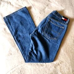 Tommy Hilfiger Jeans Tommy Jeans Vintage 1990s/2000s/Y2k Super Rare Excellent Vintage Condition (Just Worn One Time, Then Stored In A Bin For Many Years) Beautiful High Waisted Straight Leg/Boot Cut Leg Denim Jeans Size 11 Tommy Hilfiger Was All The Rage In The Late 90s And Early 00s. All The Hip Hop And Pop Stars Were Sporting The Label! This Is Truely A Y2k Fashion Staple. Material- * 100% Cotton * Colors- Medium Blue Denim * Print- Solid * Thicker Jean Material Features- * Zipper Front W/Button * Silver Front Button With Tommy Hilfiger Name * Silver Hardware * Front Pocket Has Tommy Flag Logo Detail * 2 Back Pockets W/Navy Blue, Red And White Tommy Hilfiger Logo On Back Left Side * Denim Print, Jean Material, Tommy Hilfiger Logo, Late 90s, Flag Logo, Tommy Hilfiger Jeans, Jeans Material, Tommy Jeans, Y2k Fashion