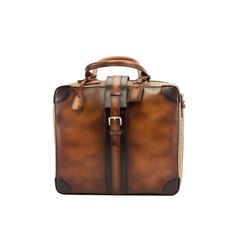 Ideal for the business traveler, the Travel Tote with the classic name tag and leather handles gives you that timeless briefcase style, measuring 14.2 x 16.5 x 6.3 inches / 36 x 42 x 16 cm. It has a main zip closure with a locking buckle strap to secure it. Designed to be functional and minimalist, it features an internal zipped pocket and a full lined interior. The removable shoulder strap makes it perfect for hands-free travel. THE DETAILS: *Burnished Materials: tweed sartorial + cognac painte Boots Store, Mens Travel, Brown Tweed, Leather Artisan, Travel Tote Bag, Tote Bag Leather, Travel Tote, Leather Travel, Name Tag