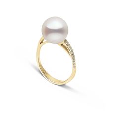 The gracefully curved solid gold and diamond band elegantly supports the lustrous 10.0-11.0 mm white Freshadama freshwater pearl. Freshadama pearls are sorted highest .01% of the freshwater pearl harvest each year. These pearls are exceptionally difficult to collect, and we've been proudly offering them for decades through our exclusive partnerships in Asia. With less than 5% deviation from a perfectly round shape, these pearls rival the finest saltwater pearls.By purchasing these pearls, you ar Timeless Wedding Pearl Ring With Brilliant Cut, Timeless Pearl Wedding Ring With Brilliant Cut, Timeless Brilliant Cut Pearl Wedding Ring, Timeless Pearl Ring With Brilliant Cut For Wedding, Elegant Diamond White Brilliant Cut Pearl Ring, Timeless Formal Pearl Ring, Classic Pearl White Diamond Ring For Formal Occasions, Pearl White Timeless Ring For Formal Occasions, Elegant White Round Cut Pearl Ring