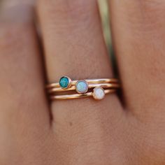 Dainty band with 3 different opal stone options. Looking for something a little bigger? Shop the 5mm stone here. Adjustable Opal Birthstone Jewelry, Adjustable Opal Birthstone Ring For Everyday, Dainty Opal Ring With Birthstone In Round Band, Opal Birthstone Jewelry For Promise Ring, Opal Gemstone Stackable Rings Gift, Opal Gemstone Stackable Gift Rings, Adjustable Opal Ring Birthstone With Round Stone, Stackable Opal Promise Ring, Minimalist Opal Birthstone Promise Ring