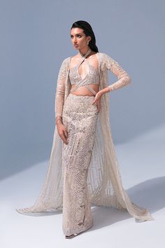 Sky Blue Lehenga Jacket for Indian Bridal Wear is an embroidered dress that gives you a glamorous look in a silver mermaid jacket lehenga. Fast Shipping Elegant Evening Choli With Pearl Embroidery, Elegant Front Open Lehenga With Intricate Embroidery, Elegant Front Open Lehenga For Party, Elegant Front Open Choli With Intricate Embroidery, Elegant Front Open Party Lehenga, Glamorous Embroidered Evening Lehenga, Hand Embellished Sequin Fabric For Reception, Elegant Long Sleeve Sequined Choli, Elegant Evening Sequin Fabric With Zari Work