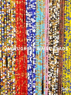 many different colored beads on display in a store window, with the words mauver bea