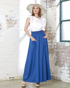 This flowing long skirt with oversized front patch pockets is perfect for achieving a casual and natural look. It can be easily paired with tanks, basic tees, or cropped tops. It's also a versatile day-to-night piece, simply add a denim jacket or leather blazer. Fit - Regular fit Fabric Features - Brushed knit, Stretchy fabric Material Composition - 96% Polyester, 4% Spandex Care Instruction - Machine wash with cold water, Do not bleach, Tumble dry low Please refer to the fact that the actual pr Denim Maxi, Denim Maxi Skirt, Cropped Tops, Leather Blazer, Natural Look, Dark Denim, Basic Tees, Stretchy Fabric, Long Skirt