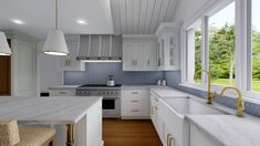 a kitchen with white cabinets and marble counter tops