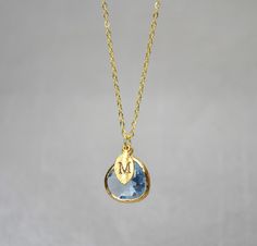 "This beautiful blue topaz necklace would be a perfect gift for a wedding, birthday, anniversary, graduation or for any occasion. The gold, rose gold or silver plated turquoise pendant is made of glass and is a gorgeous blue/green shade. It measures approximately 12.5x 16 mm and is hung on a 16\", 18\" or 20\" chain. The chain options include silver-plated, gold-plated, rose gold-plated, sterling silver, 14K gold-filled, or 14K rose gold-filled metal. The chains are dainty and very pretty - the Blue Jewelry For May Birthstone Gift, Blue May Birthstone Jewelry For Gift, Blue Jewelry Gift For May Birthstone, Personalized Blue Jewelry For May Birthstone, Elegant Blue Necklace As Gift For Mom, Elegant Blue Necklace For Mom, Personalized Blue May Birthstone Jewelry, Blue Birthstone Jewelry For Mom, Blue Birthstone Jewelry Gift For Mom