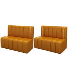 a pair of orange leather sofas with rounded back and seat cushions, on an isolated white background