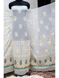 54'' Ivory Dyeable Chikankari Georgette Sequined Embroidered Fabric by the Yard Wedding Dress Indian Sequin Saree Crafting Sewing Costumes. ➤ Color : Ivory, Gold Georgette Sequence Work Fabric(Dye it in any color of your choice) ➤ Width : 54 Inches ➤ Fabric: It is Georgette Sequin Fabric ➤ Code-emb54 Dye it in any color of your choice, beautifully designed Machine Chikankari Fabric with dense embroidery (chikankari), making it an elegant party-wear outfit. You can use this fabric to make dresses Chikankari Fabric, Wedding Dress Indian, Sewing Costumes, Wedding Dresses Indian, Sequin Saree, Yard Wedding, Silk Ikat, Dress Indian, Ikat Fabric