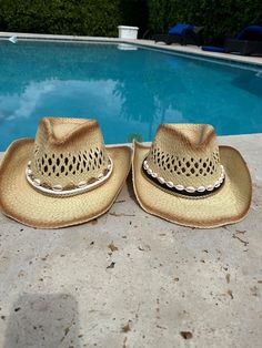 Stunning Shell Cowboy Hat.  Our beautiful customized cowgirl hat have so many uses.  You can wear this stunning hat on a trip to the beach, to a pool day, beach resorts or a cruise.  Your Summer trips pictures will look fabulous wearing these shell cow boy hats.    Beads will be added in the color of your choice with six design colors to choose from. white shell sun hat, black shell sun hat, aqua shell sun hat, orange shell sun hat, marine blue shell sun hat, red shell sun hat Summertime essenti Southern Style Summer Hats For Western-themed Events, Western Style Panama Hat For Beach And Kentucky Derby, Fedora Straw Hat For Western-themed Events, Western Style Panama Hat For Kentucky Derby At Beach, One Size Fedora Straw Hat For Western-themed Events, White Country Hat For Vacation, Wide Brim Sun Hat For Ranch, Country Style White Hat For Vacation, White Country Style Hat For Vacation