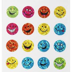 a bunch of different colored smiley faces on a white background