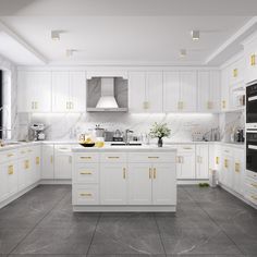 a large kitchen with white cabinets and gold trimming on the doors, counter tops and drawers